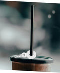 Black tumbler with lid and straw featuring Six Piece Set Straw Charms For Tumblers And Cups Cute Dangle Toppers That Are Easy To Attach
