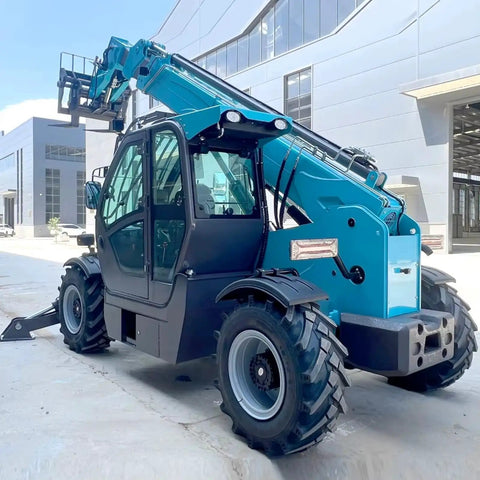 Heavy Duty Telescopic Forklift With Fast Swap Quick Hitch Setup For Effortless Pallet Handling On Rough Ground side view showcasing robust design and tires.