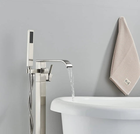 Freestanding Bathtub Faucet Floor Mount Tub Filler Brushed Nickel Brass Mixer Tap Waterfall Spout With Hand Shower 360 Degree Swivel And Single Handle next to white bathtub