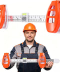 Hustle Free Picture Hanging Tool Combines Spirit Level Tape Measure And Magnetic Nail Starter For Dang Precise Frame Mirror Alignment held by a man in an orange hard hat.