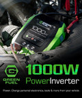Road Ready 1000W Power Inverter 2000W Peak DC 12 Volt To AC 120 Volt Converter with green casing in vehicle engine.