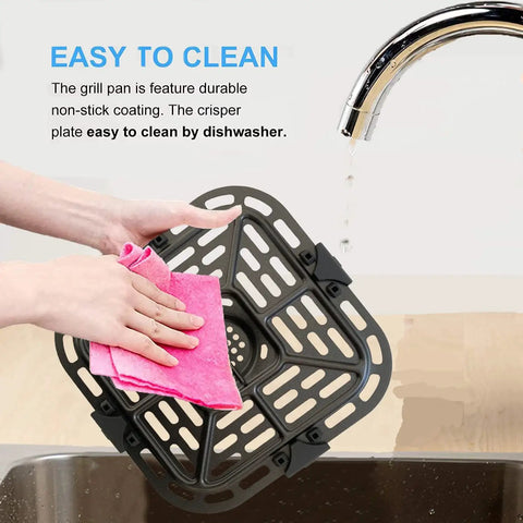 User cleaning Tough As Nails Air Fryer Grill Crisper Plate Replacement Pan for 2 Quart Mini Oven at sink.