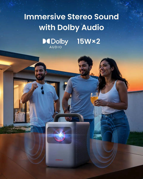 Three people enjoying music with portable speaker featuring immersive stereo sound and Dolby Audio outdoors at sunset.