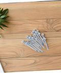 12 Piece Lawn Aerator Shoes With Metal Spikes For Lawn Aeration And Soil Relief Heavy Duty Garden Yard Spikes on wooden surface