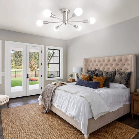 Dope Six Light Sputnik Style Ceiling Fixture In Brushed Nickel Finish illuminating a bedroom with modern decor.