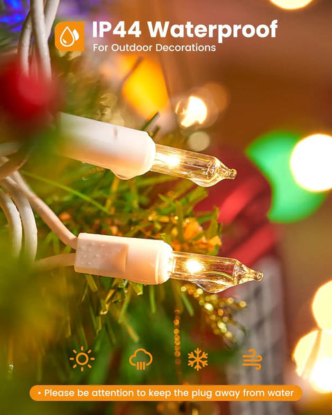 Close-up of Clear Christmas Lights Set With 100 Mini Bulbs On White Wire 20 Feet Incandescent String Lights on tree