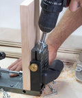 Person using Aluminum Pocket Hole Jig System Pro M2 Adjustable And Easy To Use Joinery Woodworking Tool with a drill