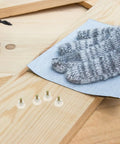 Four pieces from Ten Piece Screw On Glide Set With Suction Cups That Keep Your Sofas And Tables Stay Put on wooden plank