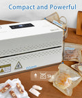 Compact Automatic Heat Sealer Machine With Digital Temperature Control And Fully Enclosed Cover for food bag sealing on countertop.