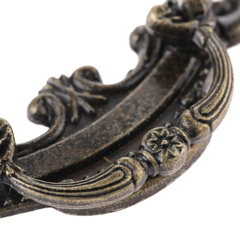 Close-up of Two Pack Vintage Antique Bronze Drawer Pull Handles for Drawers, Jewelry Boxes, Cabinets, and Furniture Hardware.