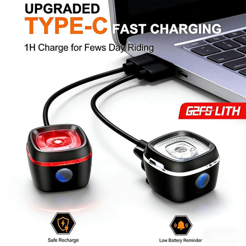 Type C Rechargeable LED Bike Front And Rear Light Set fast-charging from laptop, showing USB connection.