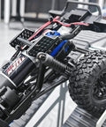 Close-up of beefy shock mount with multiple mounting positions for TRX4M Defender 1/18 RC crawler, CNC aluminum, adjustable height
