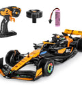 McLaren F1 Licensed 1/14 Remote Control Car, 2.4GHz RC Racer For Kids And Adults with controller and battery elements.