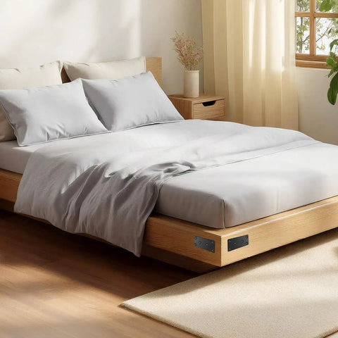 Heavy Duty Black Flat Metal Brackets For Wood Repair Set With Included Screws used on a modern bed frame.