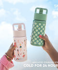 Keep Things Chill In Backpacks With This Kid Approved Confetti Insulated Water Bottle Packed With A Leak Proof Straw Lid And Double Wall Stainless Steel Build For Little Ones 14 Oz. Two colorful insulated bottles for kids held by hands outdoors.