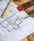 Stainless Steel Roller Catch For Wardrobe And Kitchen Cabinets on blueprint with drill and measuring tape