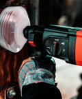 Side view of a cordless drill with a 6.25-inch bi-metal hole saw and dust bowl for recessed lighting.