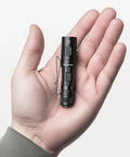 M70 EDC Flashlight 1100 Lumens USB C Rechargeable Pocket Light With Clip held in a hand showing compact size