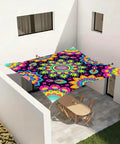 Neon Mandala UV Reactive Sun Shade Sail 6 By 8 Feet Blacklight Glow Canopy over patio table, festive outdoor decor.