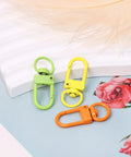 Forty Five Piece Rock Solid Metal Lobster Claw Clamps With Dope Mixed Color Combo Three Two Millimeter Slick Swivel Snap Hooks for keychain.