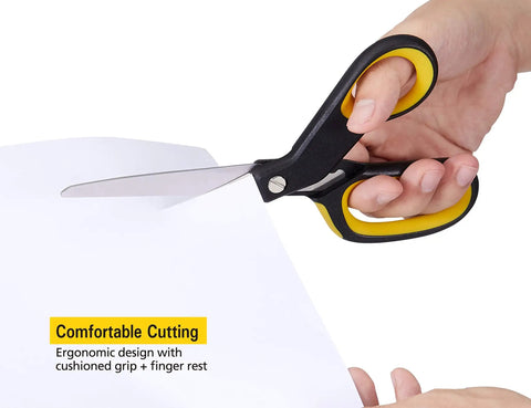 Person using All-Purpose Ergonomic Stainless Steel Scissors Pack of 2 With Cushioned Grip for Easy Cutting on white paper