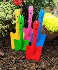 Mini Colorful Metal Hand Shovels Set 10 Pack Garden Trowels For Kids Teens And Adults Perfect For Flower Soil Planting Digging And Transplanting 11 By 3 Inches Durable Metal Garden Tools shown in soil
