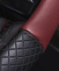 Close-up of Rhombus Microfiber Leather Steering Wheel Cover Universal Fit For Car Suv Truck Van with black and burgundy padded sides.