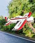 Hand holding model airplane, Rock Solid 2.4GHz RC Receiver For Drone And Fixed Wing, 6/10 Channel SBUS PWM PPM Outputs visible.