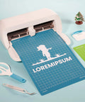 Blue and green REALIKE 8.5x12 cutting mats with grid; scissors and craft tools nearby.