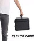 Person carrying Heavy Duty Tool Box With Drawers Hard Case Organizer For Home Garage Shop And Jobsite Portable Black Storage Cabinet