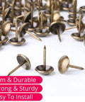 Close-up of Bronze Upholstery Tacks 100 Pack Decorative Nail Heads For Furniture, Antique Brass Finish, showing firm and durable design.