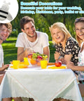 Group enjoying outdoor picnic with heavy duty stainless steel tablecloth clips no fuss set for outdoor tables in use