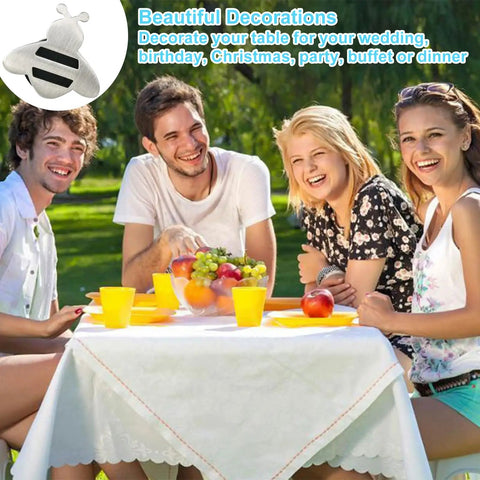 Group enjoying outdoor picnic with heavy duty stainless steel tablecloth clips no fuss set for outdoor tables in use