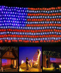 Patriotic Flag String Lights With 420 Super Bright LEDs Waterproof Net Light For Yard And Garden Decor Ideal For Holidays Parties Memorial Day Fourth Of July Christmas And Outdoor Festivities displayed outdoors.