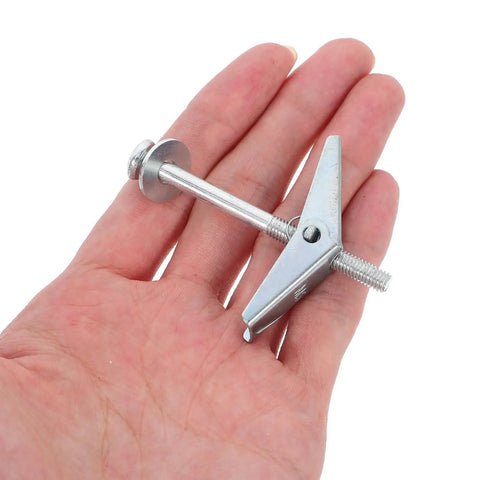 Top Shelf 30 Piece Carbon Steel Drywall Anchors M5 X 60mm Butterfly Toggles held in hand, demonstrating size and feature.