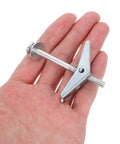 30 Pack Heavy Duty Carbon Steel Drywall Anchors shown in hand, highlighting mushroom petal design for easy installation.