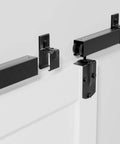 Close-up of Exterior Barn Door Hardware Kit With Door 96 By 84 Inches K Frame 16 Foot Heavy Duty Black Sliding Track System