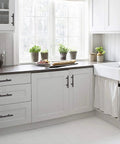 White kitchen with 30 Pack Oil Rubbed Bronze Cabinet Drawer Pulls Made From Solid Stainless Steel For Kitchen Cabinets Built To Last Beefy Five Inch Center To Center Half Inch Diameter Rugged Heavy Duty Hardware on drawers and cabinets.