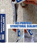 Heavy Duty 9900 White Silicone Structural Sealant Waterproof Adhesive for Roofing Bathroom Construction DIY Repairs Knockout Bonding Compound Game Changer Caulking Tube applied on a textured surface.