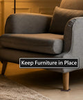 High Performance Non Slip Furniture Cups And Square Caster Pads For Hardwood Floors under a gray sofa, preventing drift and scuffs.