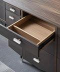 Sweet Finish T-Shaped Marble Cabinet Knobs With Brushed Brass Base on dark wood dresser with open drawer.