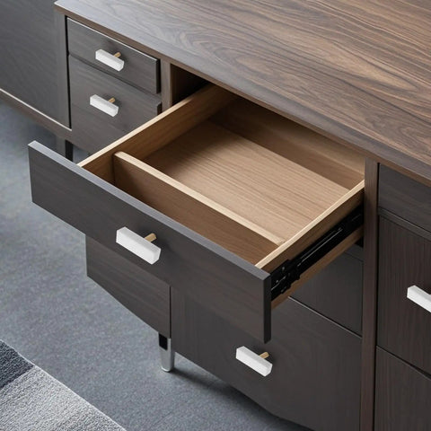 Sweet Finish T-Shaped Marble Cabinet Knobs With Brushed Brass Base on dark wood dresser with open drawer.
