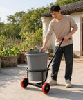 Heavy Duty Steel Bucket Cart With Padded Handle, Two Wheel Rolling Transport Cart For Buckets And Containers, Easy Glide Wheels, Tubular Frame, Portable Home And Yard Helper For Moving Heavy Loads Without Lifting, man moving bucket outdoors