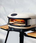 Arc And Arc XL Pizza Oven Stand For Outdoor Use With Locking Wheels Adjustable Wood Wings For Ingredients And Tools Hanging Hooks For Cookware Sturdy Steel Frame Easy Mobility And Secure Oven Support.