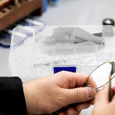 Close-up of All In One Eyeglass Repair Kit With 99 Piece Screw Set Nose Pads And Precision Screwdrivers For Rimless Glasses And Sunglasses