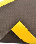 Corner detail of Bubble Textured Anti Fatigue Mat With Dyna Shield For Industrial And Commercial Workspaces Three Foot By Six Foot By One Half Inch Slip Resistant Cushioning Tough As Nails Black And Yellow Mat For Standing Long Shifts