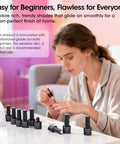 Woman applying Ultimate 24 Piece Gel Nail Polish Kit With 20 Dope Shades And 4 Essential Coats Base Coat Glossy Top Coat Matte.