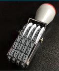 Close-up of a Killer 4 Digit Number Roller Stamp With Changeable Dial Wheel for Egg Dating and Custom Marking, showing adjustable rubber dials.