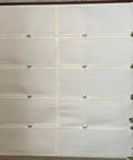 Built Tough 4x180 Feet White Vapor Barrier Tape Heavy Duty Waterproof Crawlspace Sealant No Nonsense Moisture Shield For Insulation And Metal Building Joints Made In USA One Roll applied to garage door.