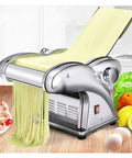 Versatile Electric Noodle Maker And Heavy Duty Pasta Machine With Three Quick Swap Blades For Fresh Spaghetti Fettuccini Lasagna Sheets Plus Dumpling Molds Zero Hassle Home Kitchen Game Changer, extracting fresh pasta.